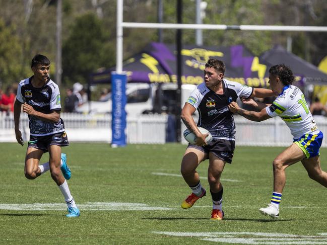 Lochlin Moses looks to push a pass. Picture: Andrea Francolini