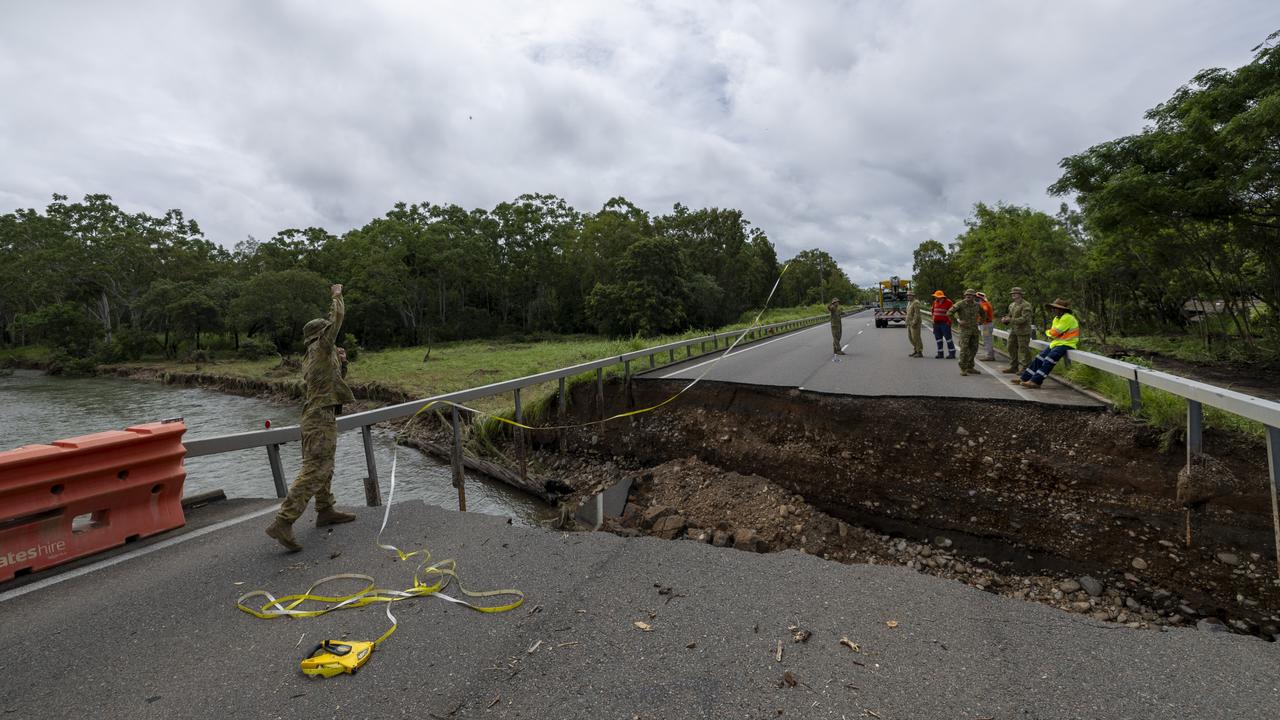 Floodwaters are rising at the recently repaired Ollera Creek Bridge on the Bruce Highway north of Townsville. The bridge to Ingham was cut in two by floodwaters on February 2. Picture: ADF