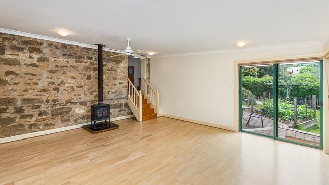 The Summertown house includes a feature stone wall.