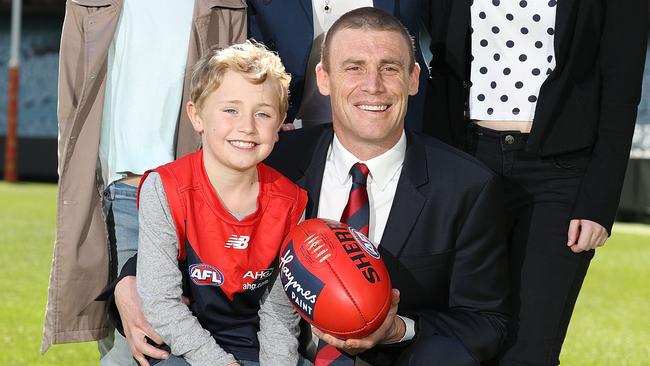 New Melbourne coach Simon Goodwin coach with his son Eddie.