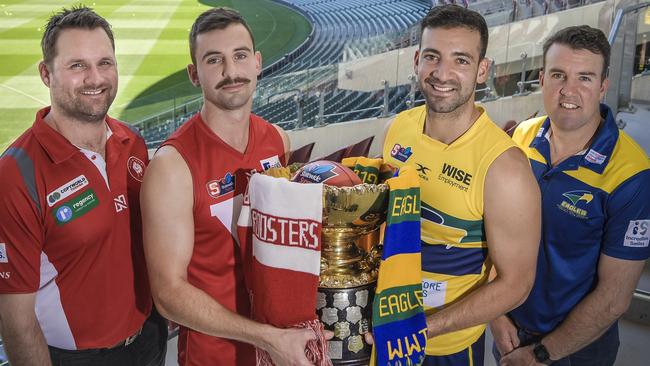 North coach Jacob Surjan with Alex Spina and Woodville-West Torrens’ Jimmy Toumpas and Jade Sheedy. Picture: Roy Van Der Vegt