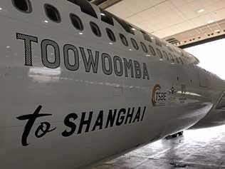 The TSBE branded Qantas A330 set for Brisbane West Wellcamp Airport to Shangai for the AccessChina'16 trade mission. Picture: Contributed