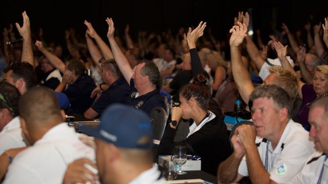 Union members vote at the meeting. Picture: Luke Richards