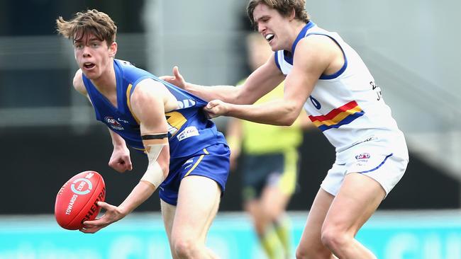 Western Jets’ Jack Watkins fires off a handball. Picture: Getty Images