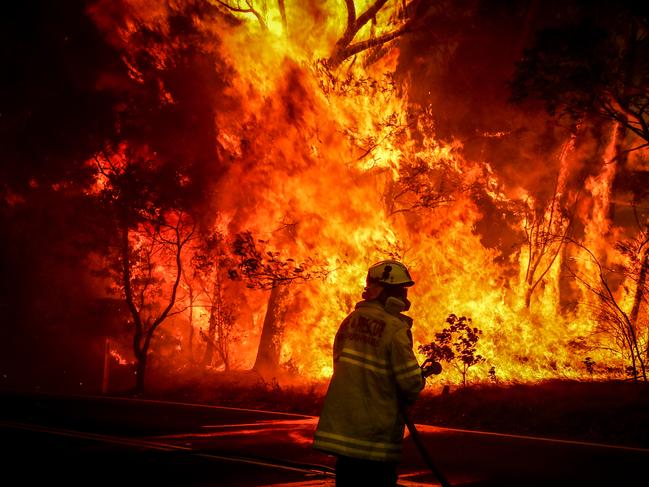 TOUGH: Fighting a fire in Bilpin, NSW, in December. Picture: David Gray/Getty