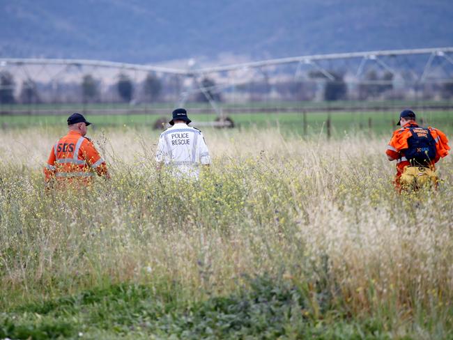 Police and SES conduct a line search near the Gunnedah farmhouse where a 14-year-old girl allegedly murdered a 10-year-old.