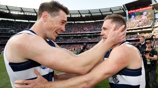 Jeremy Cameron and Joel Selwood celebrate.