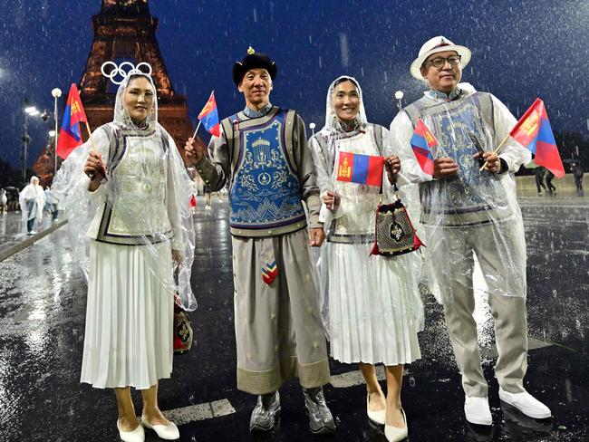 Members of Mongolia's delegation pose on the Iena Bridge during the opening ceremony of the Paris 2024 Olympic Games. Picture: AFP