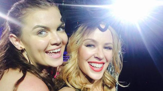 Lucky fan Amy Hardy was invited on stage for a selfie with Kylie Minogue at Perth Arena. Photo: Twitter/Amy Hardy