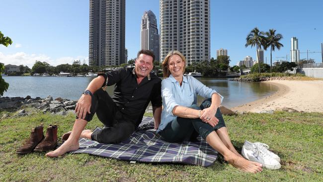 Today Show hosts Karl Stefanovic and Allison Langdon get their feet wet at Surfers Paradise before filming begins. Picture: Glenn Hampson