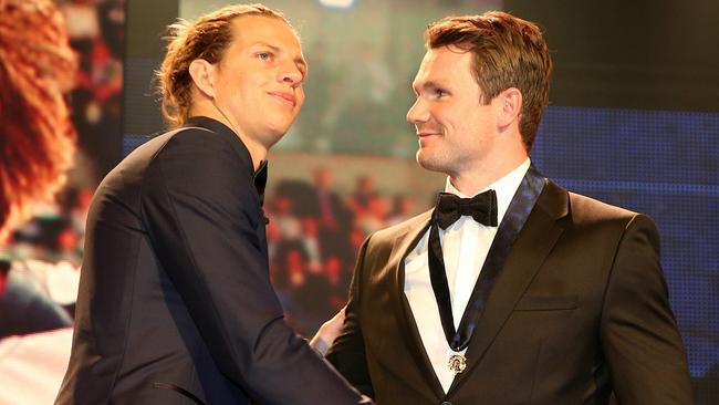 Patrick Dangerfield received the Brownlow Medal from Nat Fyfe. Picture: Michael Klein