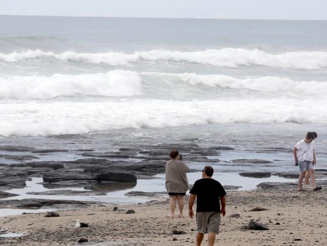 Surfer rescued, beaches closed due to marine warning