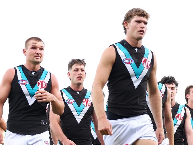 BALLARAT, AUSTRALIA - MAY 03: Port Adelaide players depart the field following the round eight AFL match between Western Bulldogs and Port Adelaide Power at Mars Stadium, on May 03, 2025, in Ballarat, Australia. (Photo by Morgan Hancock/Getty Images)