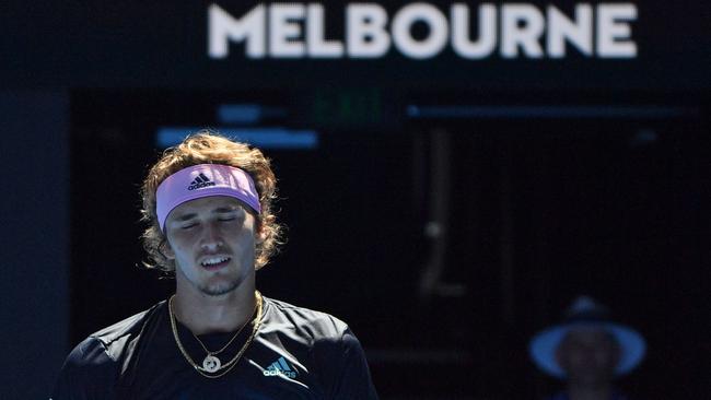 Germany's Alexander Zverev reacts while playing against Canada's Milos Raonic. Picture: Paul Crock/AFP