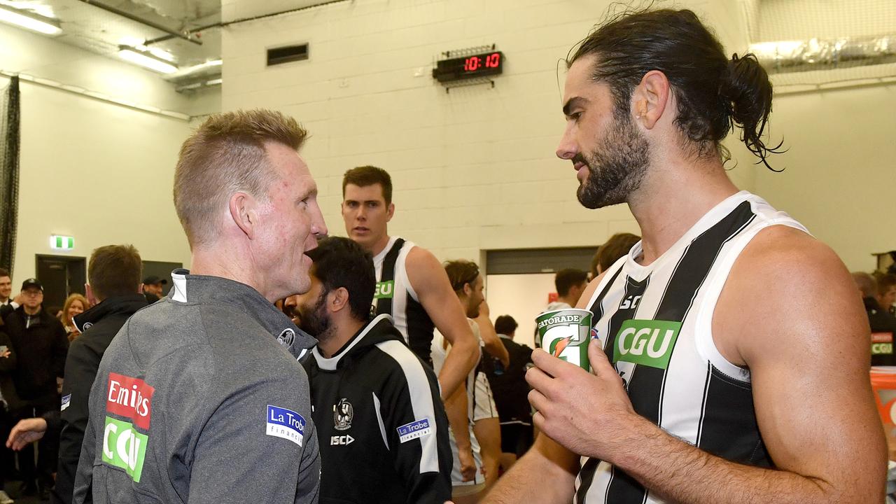 Collingwood Coach Nathan Buckley with Brodie Grundy after the Round 4 AFL match between the Adelaide Crows and the Collingwood Magpies at Adelaide Oval in Adelaide, Friday, April 13, 2018. (AAP Image/Sam Wundke) NO ARCHIVING, EDITORIAL USE ONLY
