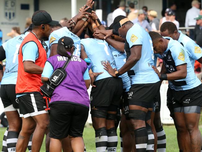 The Fijians celebrate.