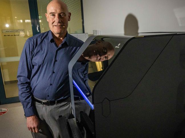 Medical technology start-up Fertilis founder Professor Jeremy Thompson with the fastest high resolution 3D 2PP printer in the world, on September 19th, 2022, at University of SA at Mawson Lakes.Picture: Tom Huntley