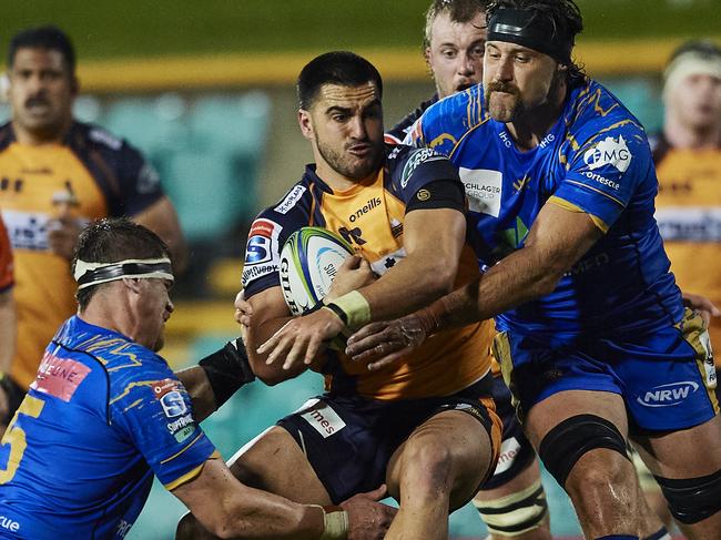 SYDNEY, AUSTRALIA - JULY 25: Tom Wright of the Brumbies is tackled during the round 4 Super Rugby AU match between the Western Force and the Brumbies at Leichhardt Oval on July 25, 2020 in Sydney, Australia. (Photo by Brett Hemmings/Getty Images)