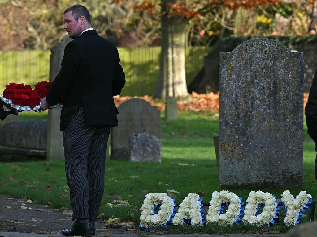 A floral tribute reading “Daddy” was seen lying outside the church. Picture: Justin Tallis/AFP