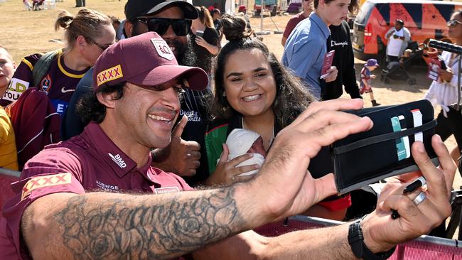 BUNDABERG, AUSTRALIA - JUNE 01: Johnathan Thurston takes a selfie photo with fans during the Queensland Maroons State of Origin fan day on June 01, 2021 in Bundaberg, Australia. (Photo by Bradley Kanaris/Getty Images)