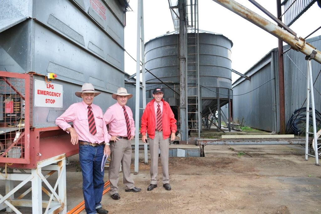 Elders Toowoomba rural sales consultant Bob Loiterton and principals Ross Troy and Trevor Leishman prepare to auction the assets of Wellcamp Downs. Picture: Dave Noonan