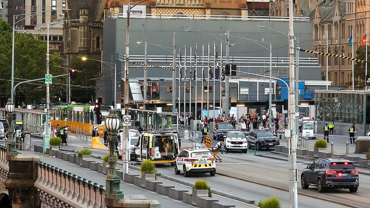 Two separate incidents unfolded on a busy Melbourne bridge on Friday evening which resulted in a PSO shooting a man. Picture: Ian Currie