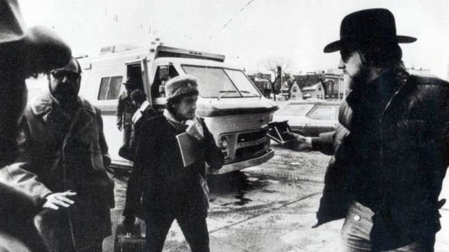 ... and Bob Dylan’s former band manager. That’s Bob in the middle and Jon on the right.