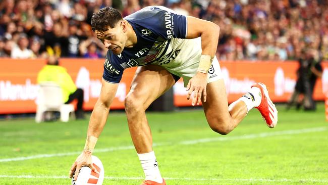 Braidon Burns of the Cowboys scores a try during the round 11 NRL match, 2024. (Photo by Chris Hyde/Getty Images)