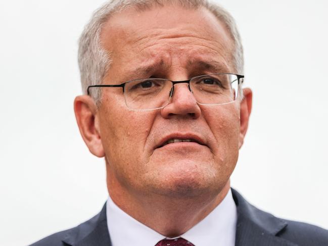 BRISBANE, AUSTRALIA - MAY 16: Prime Minister Scott Morrison speaks to the media at a press conference following a visit to Springfield Rise Sales & Information Centre, which is in the Blair electorate, on May 16, 2022 in Brisbane, Australia. The Australian federal election will be held on Saturday 21 May. (Photo by Asanka Ratnayake/Getty Images)