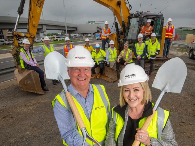 Work is about to begin on a massive upgrade to the airport that will build aerial roads, connect terminals and battle congestion.John Kirkwood, CEO and Managing Director of Seymour Whyte, and Lorie Argus, Melbourne Airport Chief Commercial Officer,  prepare to turn the first soil of the new project.Picture Jay Town