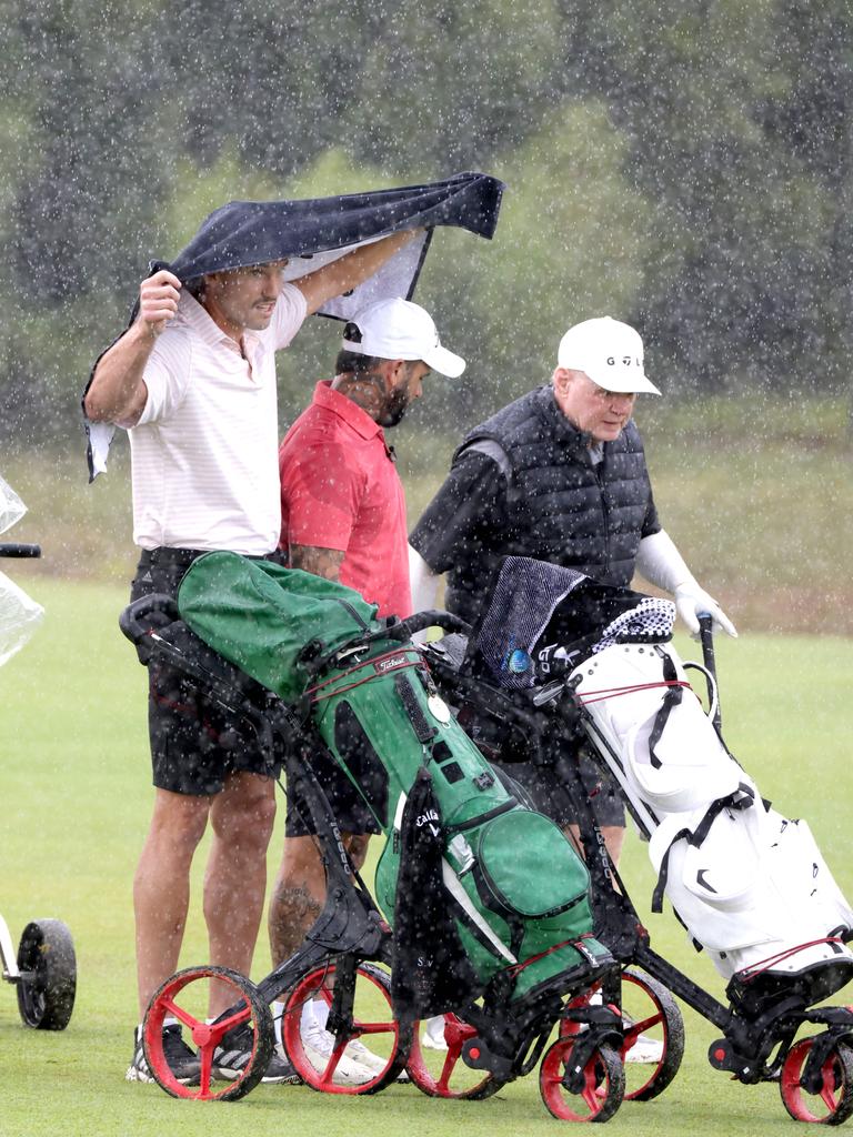 L to R, Corey Oates with Adam Reynolds and Paul 'Fatty' Vautin, Broncos players, at Australian PGA Celebrities in pro-am, Eagle Farm, on Wednesday 22nd November 2023 – Photo Steve Pohlner