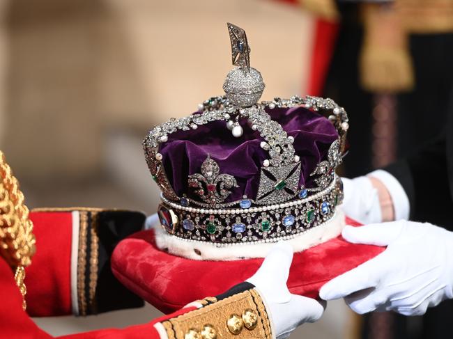 The Imperial State Crown arrives through the Sovereign's Entrance ahead of the State Opening of Parliament in the House of Lords at the Palace of Westminster. Picture: Getty Images