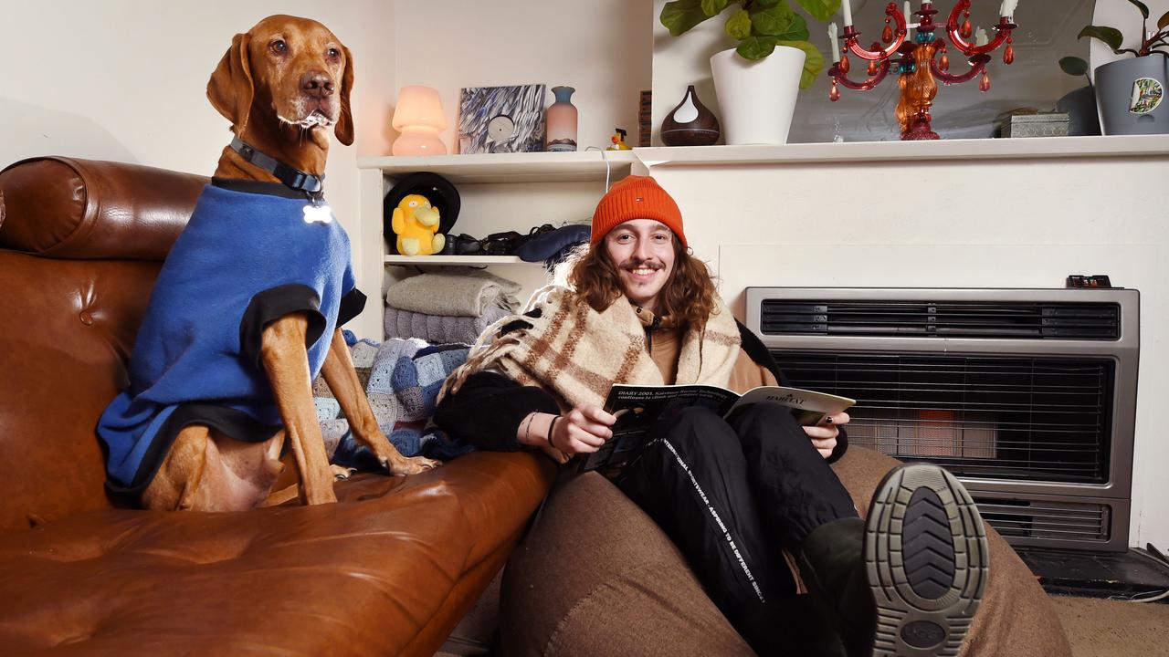 Mr Casalis and his dog Bruno will often cuddle up on the couch to stay warm. Picture: NCA NewsWire / Nicki Connolly