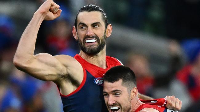 MELBOURNE, AUSTRALIA - JUNE 12: Brodie Grundy of the Demons is congratulated by Alex Neal-Bullen after kicking a goal during the round 13 AFL match between Melbourne Demons and Collingwood Magpies at Melbourne Cricket Ground, on June 12, 2023, in Melbourne, Australia. (Photo by Quinn Rooney/Getty Images)