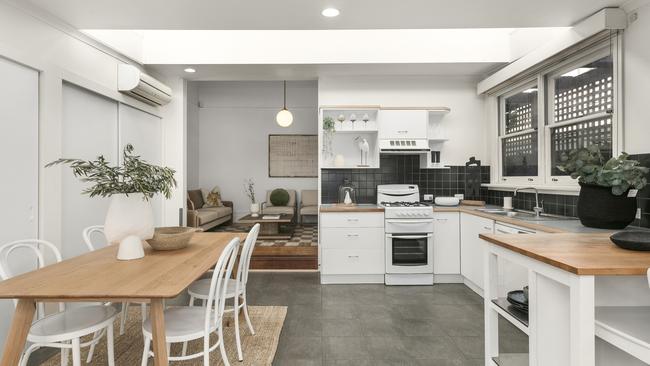 The house features ornate ceilings, stained glass windows, Baltic pine floors, a European laundry and combined kitchen and meals space with a raked ceiling.