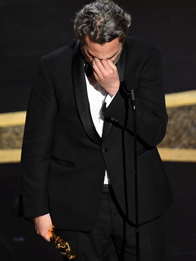 An emotional Joaquin Phoenix accepts the Actor In A Leading Role award for 'Joker'. Picture: Kevin Winter/Getty