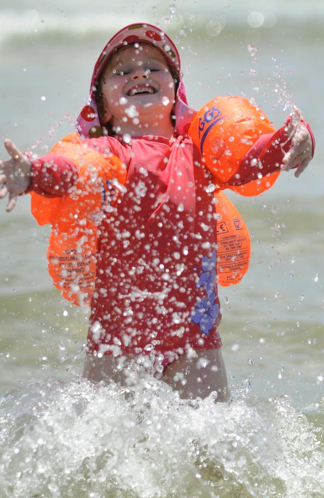 Five-year-old Charlie from the UK ends 2009 with a splash at Mills Beach, Mornington. Picture: supplied