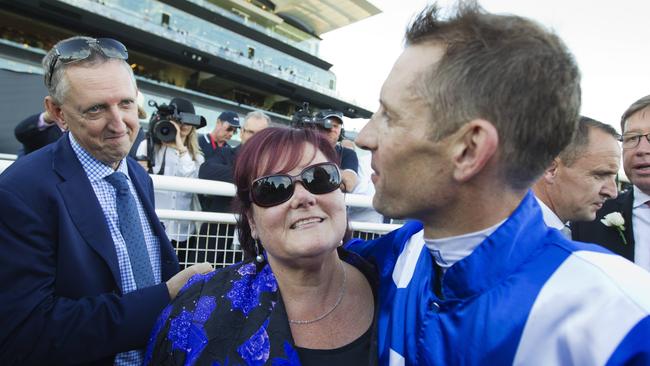 Debbie Kepitis embraces Hugh Bowman after Winx’s victory in the Doncaster. Picture: Jenny Evans