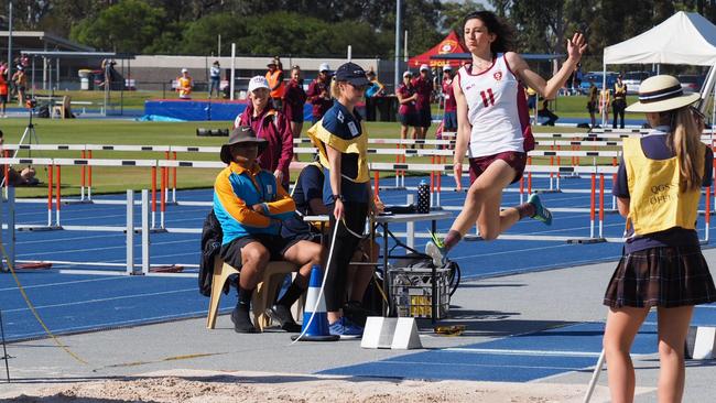 Hilal Durmaz in full flight in the long jump pit for St Peters at the QGSSSA: PICTURE: Louis Moore.