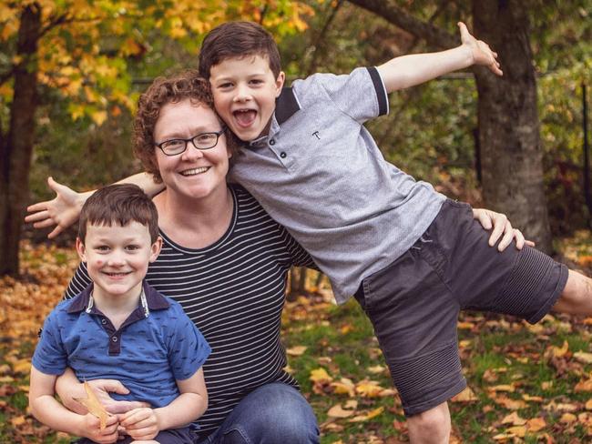 Trish Smith with Russell and Ben, who were found stabbed to death in their home.