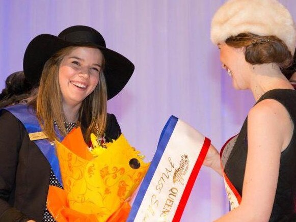 Sophie Hughes receives the 2014 Miss Showgirl sash from Donna Baker of Monto, 2013 Queensland Miss Showgirl. Photo Contributed. Picture. Contributed