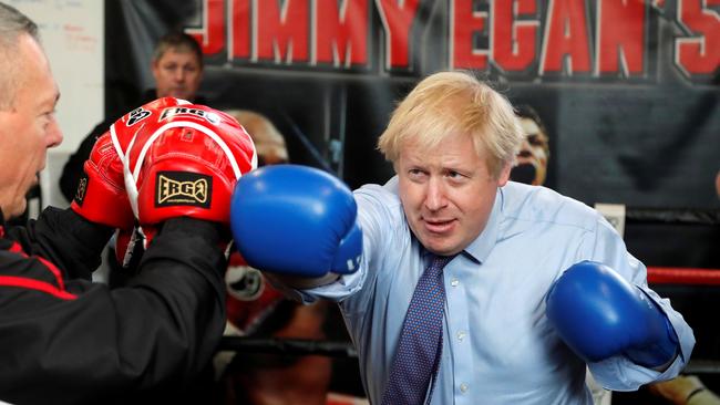 Boris Johnson works out with trainer Steve Egan in Manchester last week. Picture: Reuters