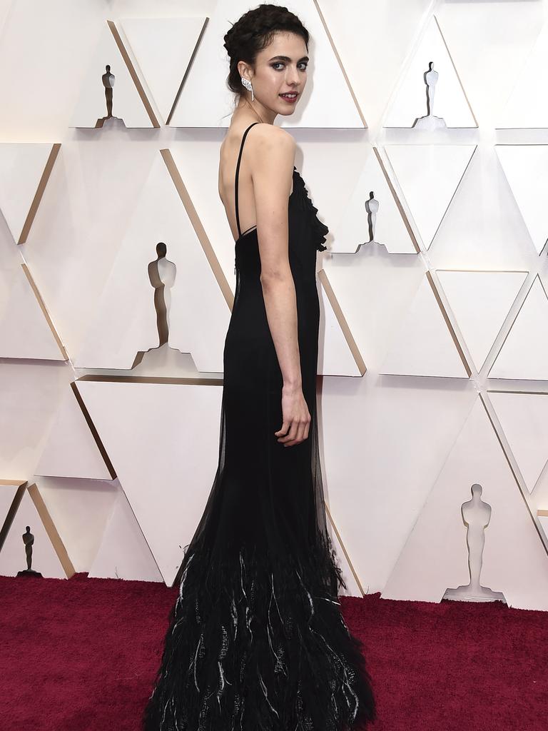 Clearly not content with her show-stealing performance in Once Upon A Time ... In Hollywood, actress Margaret Qualley has turned her attention to the Oscars red carpet. Picture: AP