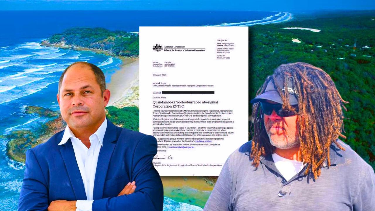North Stradbroke Island’s QYAC chair Cameron Costello, right, and island elder and traditional owner Mark Jones with the letter he wrote to ORIC.