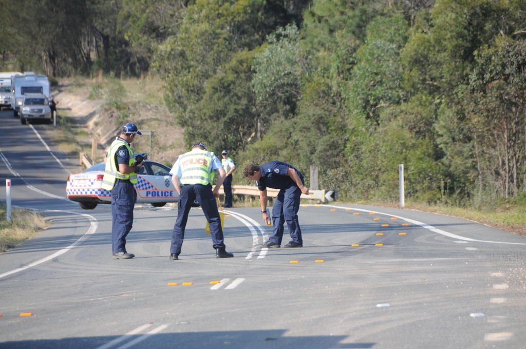 Police start work to confirm the cause of the accident. Picture: Craig Warhurst