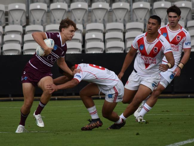 Dane Woollett escapes a tackle by Jasais Ah Kee. Picture: Sean Teuma