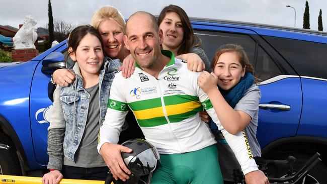 Kieran Modra with his wife Kerry and their three girls in 2016 Picture: Mark Brake