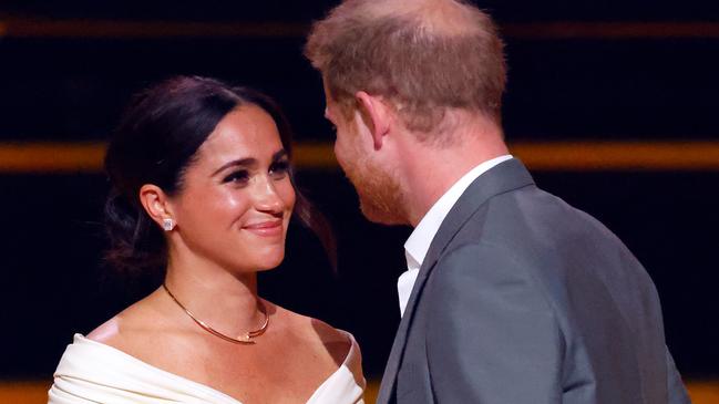 THE HAGUE, NETHERLANDS - APRIL 16: (EMBARGOED FOR PUBLICATION IN UK NEWSPAPERS UNTIL 24 HOURS AFTER CREATE DATE AND TIME) Meghan, Duchess of Sussex and Prince Harry, Duke of Sussex on stage during the Opening Ceremony of the Invictus Games 2020 at Zuiderpark on April 16, 2022 in The Hague, Netherlands. (Photo by Max Mumby/Indigo/Getty Images)