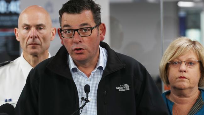 Premier Daniel Andrews with Emergency Management Commissioner Andrew Crisp and Minister for Police Lisa Neville. Picture: David Crosling