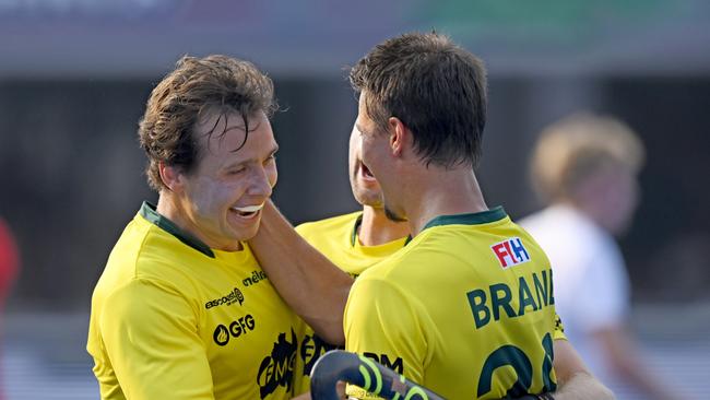 Australia's Tom Craig (left) celebrates with teammate Tim Brand (right) after scoring a goal in the team's 8-0 victory over France. (Photo by WorldSportPics/Frank Uijlenbroek)